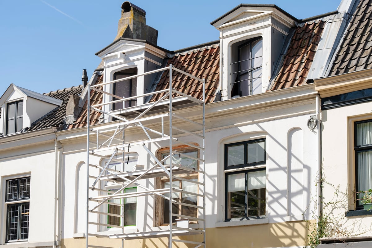 Scaffolding erected against a building for maintenance
